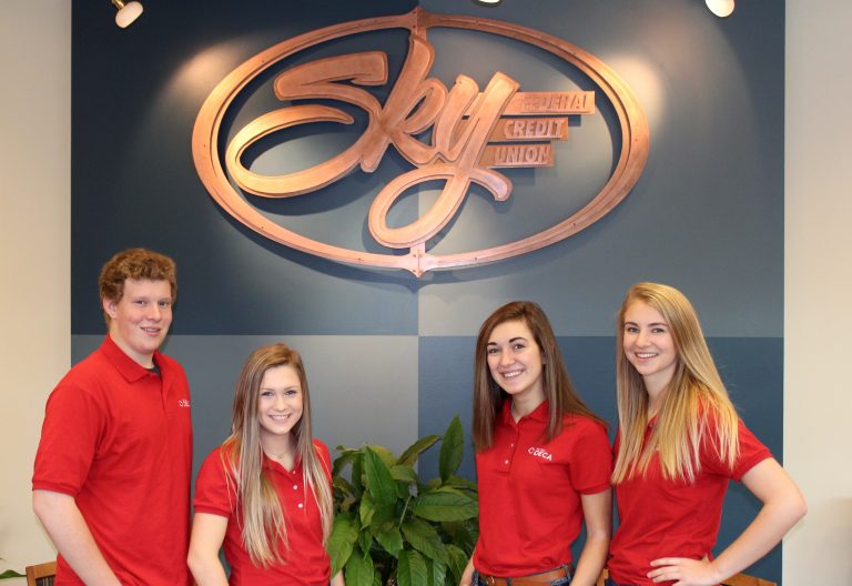 State Officers Pictured under Sky FCU Logo in our Bozeman Branch Office